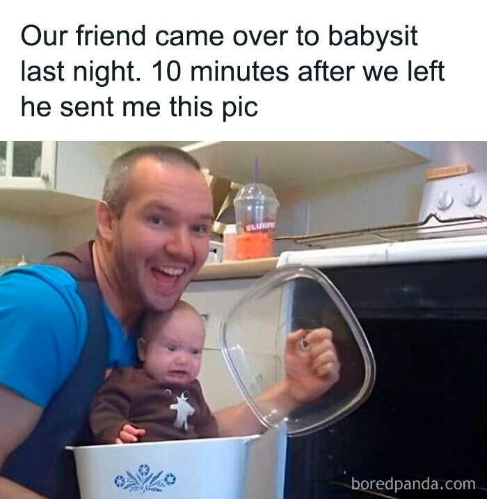 Man babysitting, holding a baby in a pot with an oven lid, capturing a funny viral meme moment from a chaos goldmine page.