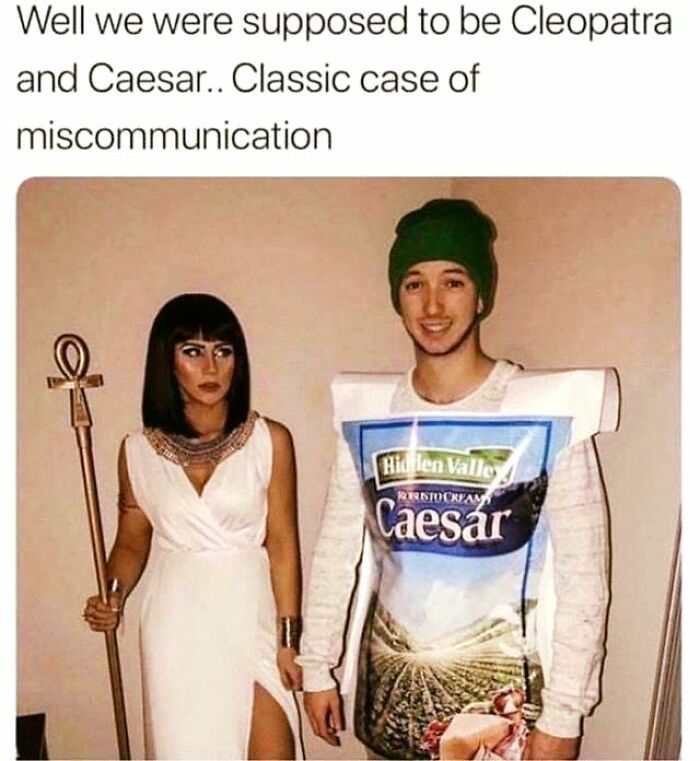 Couple in Cleopatra and Caesar costumes creating a hilarious archeology and history meme about miscommunication.