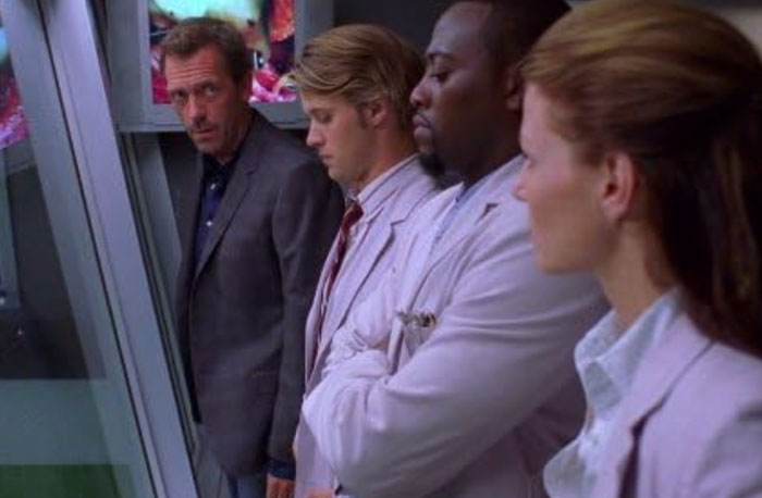 Doctors from House M.D. examining a patient case, showcasing the accuracy of medical diagnoses in the TV series.