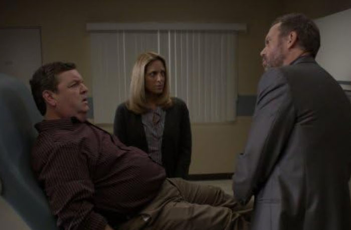 Doctors discussing patient symptoms in a clinical setting analyzing the most accurate and least accurate diagnoses from House M.D.