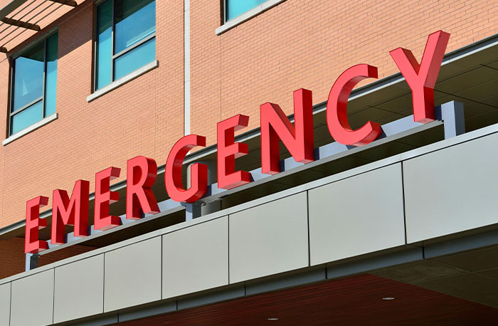 Emergency department exterior with bold red letters emphasizing medical diagnoses accuracy from House M.D. doctors' review.