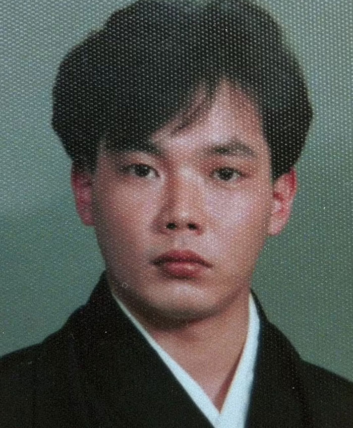 Young man in a dark jacket with a serious expression, representing a scary real-life story that people can’t tell without shuddering.