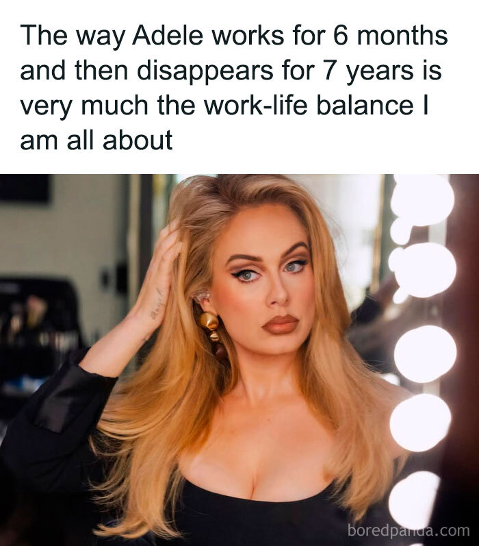 A woman with long blonde hair posing in front of a lighted mirror, illustrating relatable funny memes about work-life balance.