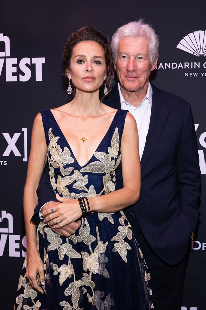 Richard Gere posing with a woman at an event, related to Richard Gere&rsquo;s multimillion-dollar home demolition.