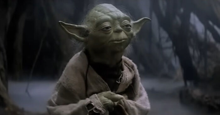 Yoda from Star Wars in a forest scene, illustrating a humorous way to ruin a first date by bringing mum along.