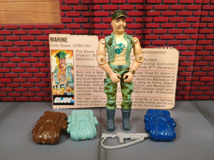 Vintage toys worth fortune featuring a G.I. Joe action figure with accessories and character card on display.