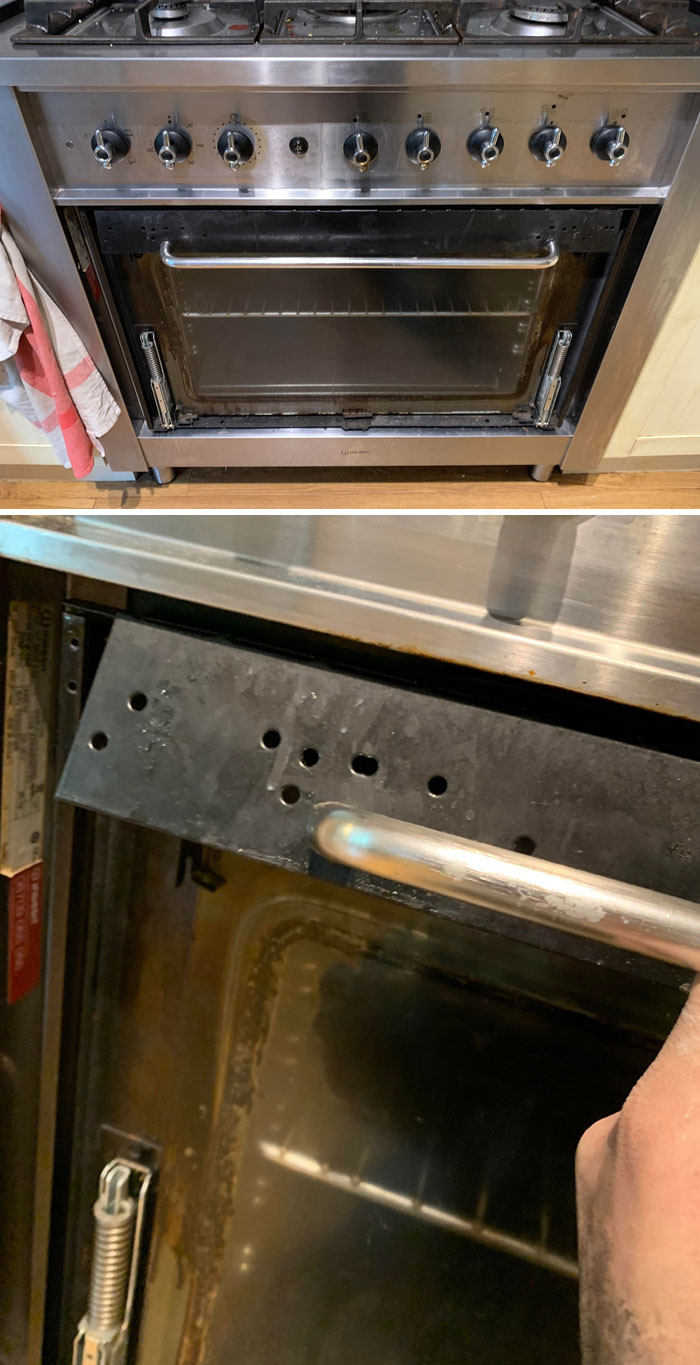 Old oven door handle broken and held up by hand inside a rental kitchen, showcasing landlord neglect and renter frustration.