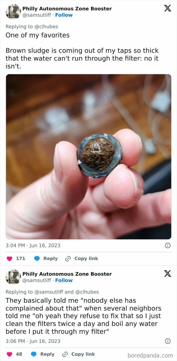 Hand holding a clogged tap filter covered with thick brown sludge showing landlord negligence in rental property.