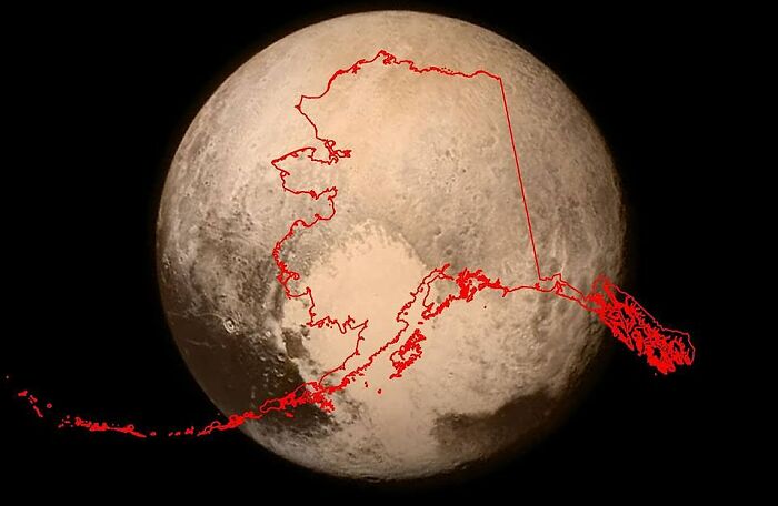 Map of Alaska outlined in red over the surface of a planet, illustrating one of the funny and bad maps.