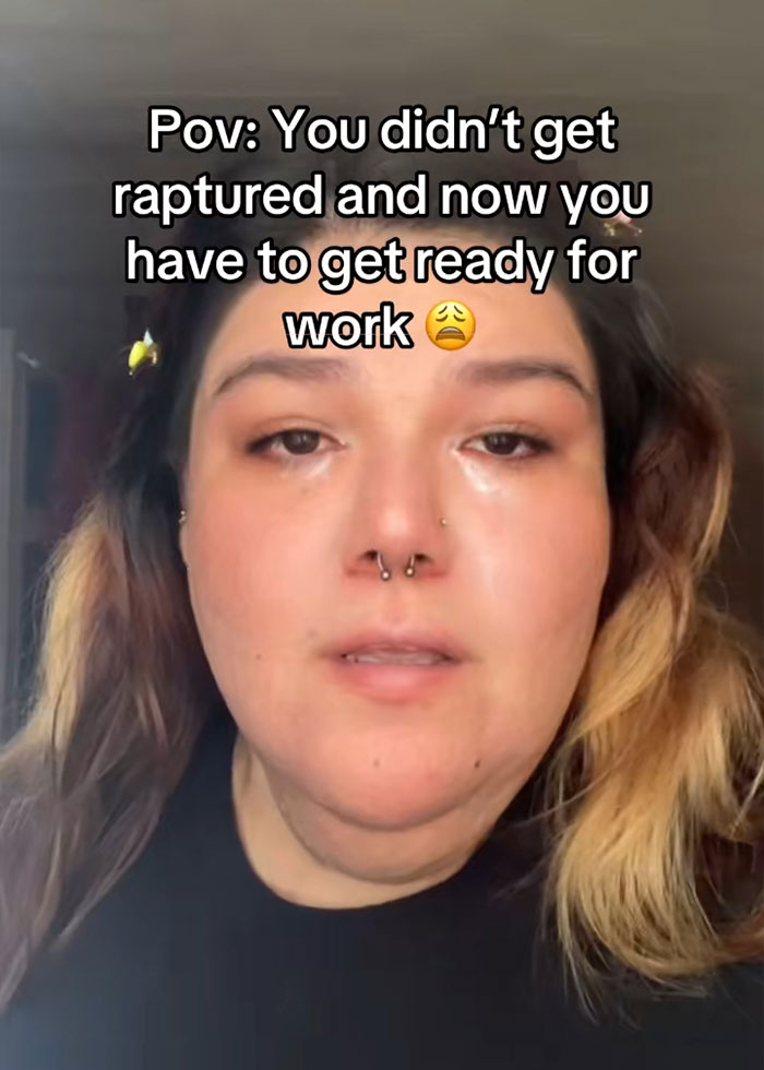 Person with tears in eyes and nose piercings reacting to RaptureTok viral prediction falling flat on social media.
