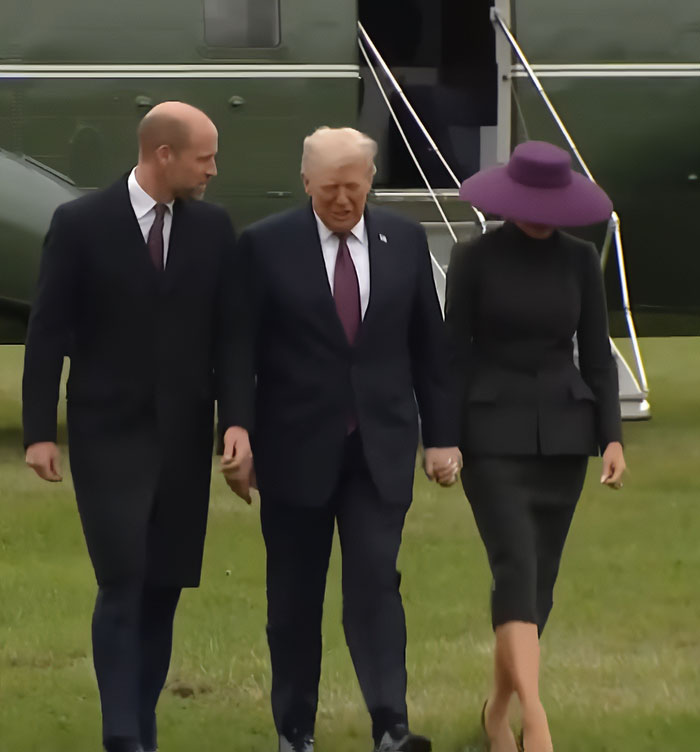 Melania Trump wearing a striking purple hat and outfit, walking with Donald Trump and another man near a helicopter. Melania Trump wearing a striking purple hat and outfit, walking with Donald Trump and another man near a helicopter.