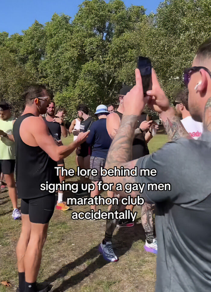 Group of people outdoors at a gay running club event, capturing the awkward moment of accidental signup on phone. Group of people outdoors at a gay running club event, capturing the awkward moment of accidental signup on phone.