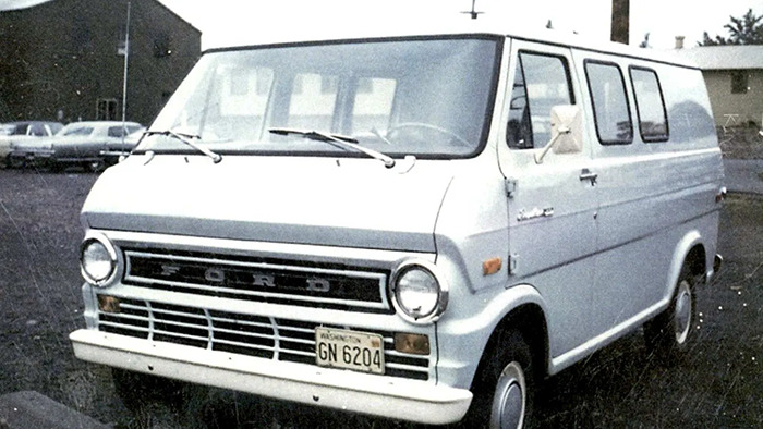 Old white Ford van parked on a street, possibly linked to teen escape and survival story in homicide serial spree podcast.