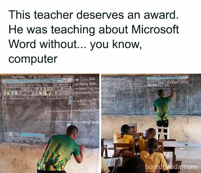Teacher drawing Microsoft Word interface on chalkboard to teach computer skills in a classroom, wholesome posts distraction.