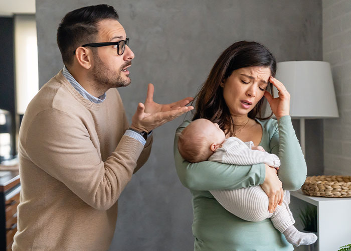 Mom frustrated with husband in nursery, holding baby, realizing he has a real problem and planning an exit strategy. Mom frustrated with husband in nursery, holding baby, realizing he has a real problem and planning an exit strategy.