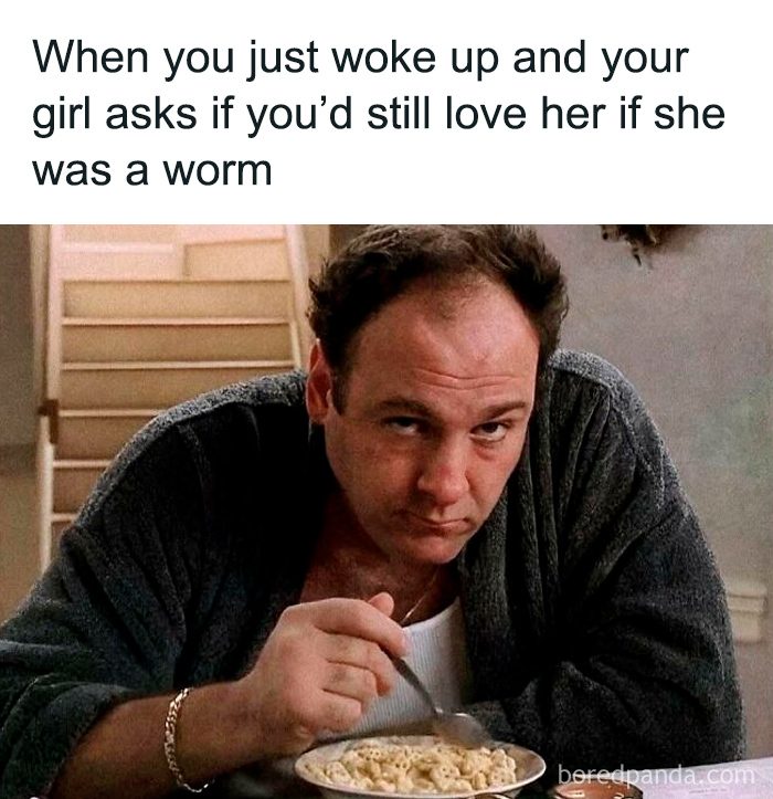 Man in a bathrobe eating cereal with a tired expression, relatable TV memes about love and early mornings.