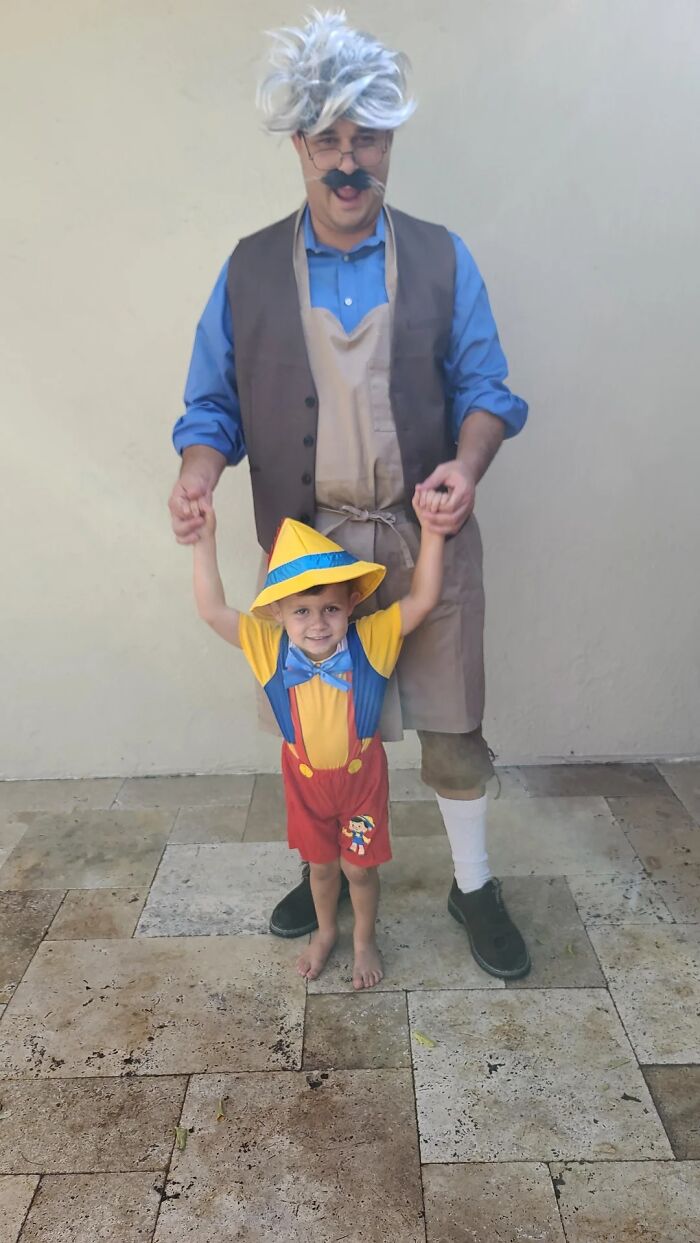Man transforming into Tom Hanks character with child dressed as Pinocchio, showcasing creative costume and transformation skills.