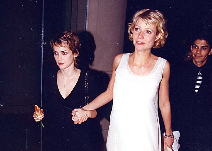 Two celebrity best friend duos holding hands, dressed for a night out, representing dramatic breakup moments.