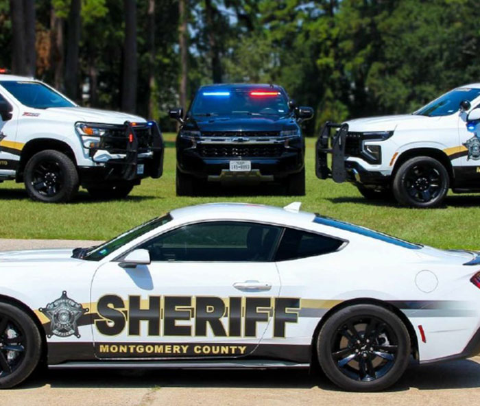 Montgomery County sheriff vehicles parked on grass during daytime related to 12-year-old escaping mistreatment case