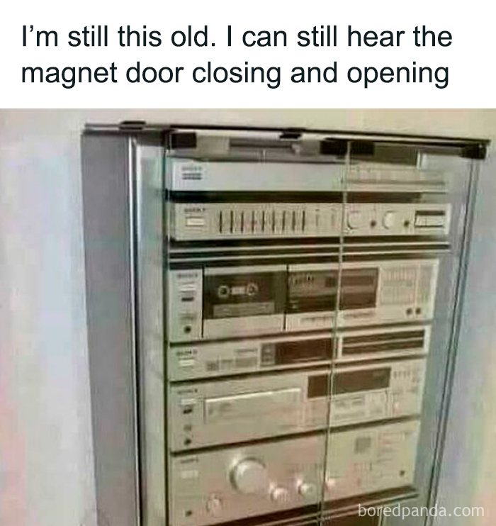 Vintage stereo system in a glass case with cassette player and vinyl records, evokes nostalgia for those who recognize it.