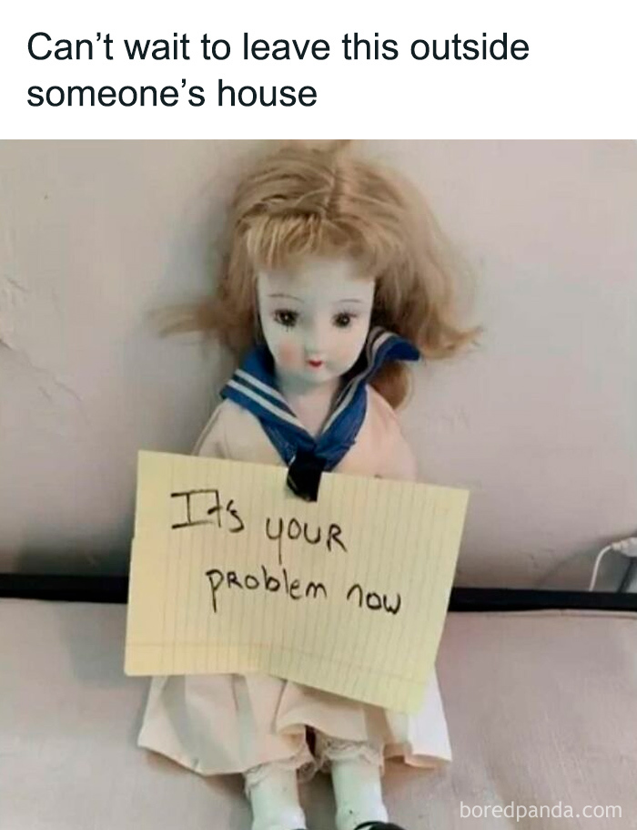 Creepy vintage doll holding a note saying its your problem now, a relatable meme for horror and Halloween fans.