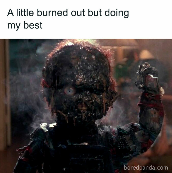 Burned horror movie character doll with a smoky, charred face raising a fist, showcasing hilarious horror movie meme humor.