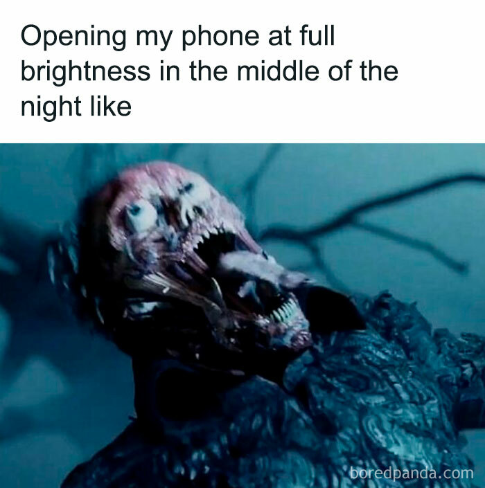 Hilarious horror movie meme showing a grotesque monster reacting to opening a phone at full brightness at night.