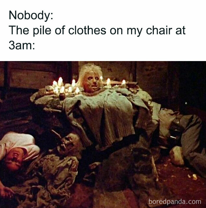 Funny horror movie meme showing skeletons dressed in clothes and lit candles, representing a pile of clothes at 3am.