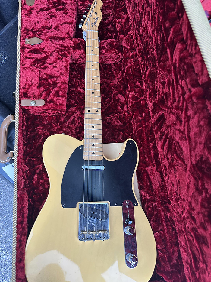 Vintage Fender guitar in red velvet case, featured in story about man buying a $50K guitar for $4K. Vintage Fender guitar in red velvet case, featured in story about man buying a $50K guitar for $4K.
