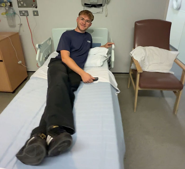 20-year-old man in hospital bed resting after deciding to amputate his leg following a rock concert experience