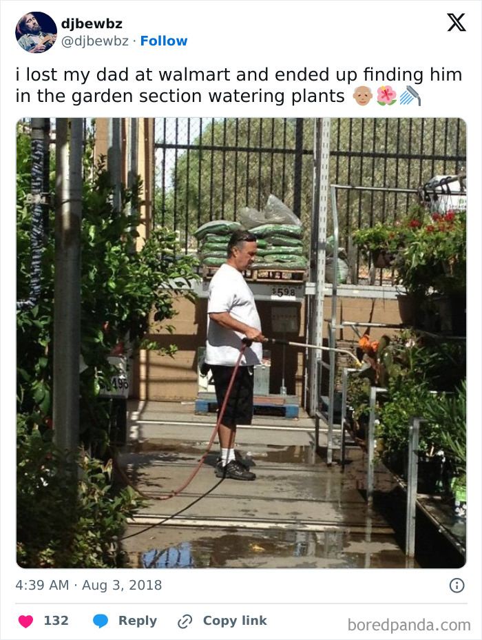 Man watering plants in the garden section of Walmart, showcasing a typical quirky People of Walmart moment.