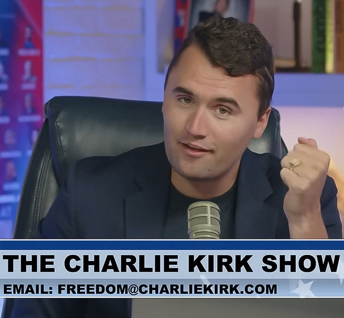 Man speaking on the Charlie Kirk Show podcast in a studio, related to Dad discovers life of Charlie Kirk homework assignment.