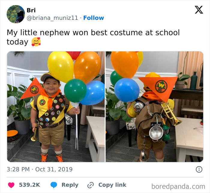 Boy in creative Halloween costume holding colorful balloons, showcasing one of the amazing kids' Halloween costume ideas that worked like magic.