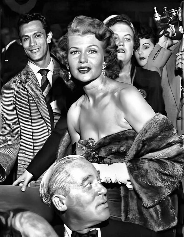 Black and white photo of glamorous movie stars and industry people leaving a mark in the movie and music industries.