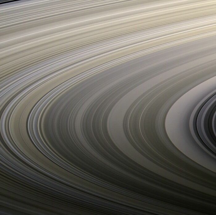 Close-up astronomy photo of Saturn's intricate rings showcasing the beauty and mystery of space.