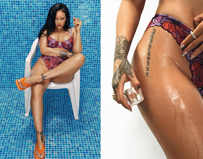 Rihanna sitting in a pool chair with multiple tattoos visible on her arms, legs, and torso wearing a floral swimsuit.