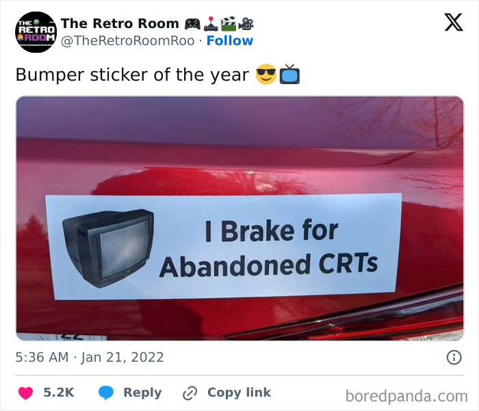Bumper sticker on red car reading I Brake for Abandoned CRTs with a retro TV illustration, clever and hilarious roadside humor.