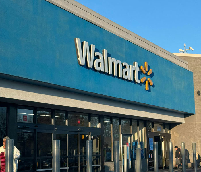 Walmart store exterior on a sunny day, one of the places people wouldn’t revisit even if paid.