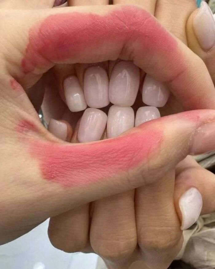 Close-up of a confusing image showing hands and nails that create a weird illusion where things only get weirder.