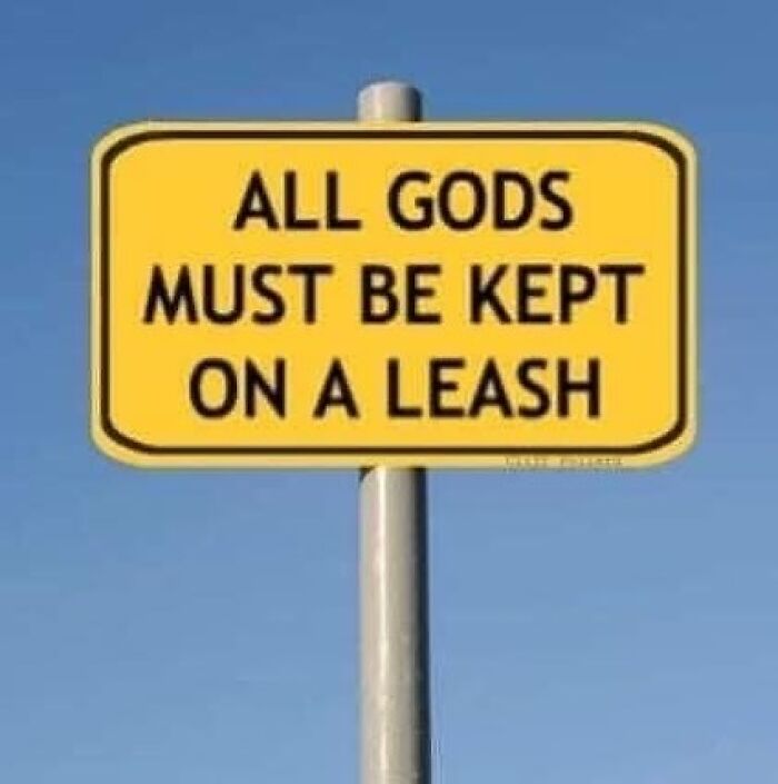 Yellow street sign with confusing message about gods, illustrating one of the confusing images where things only get weirder when observed closely.