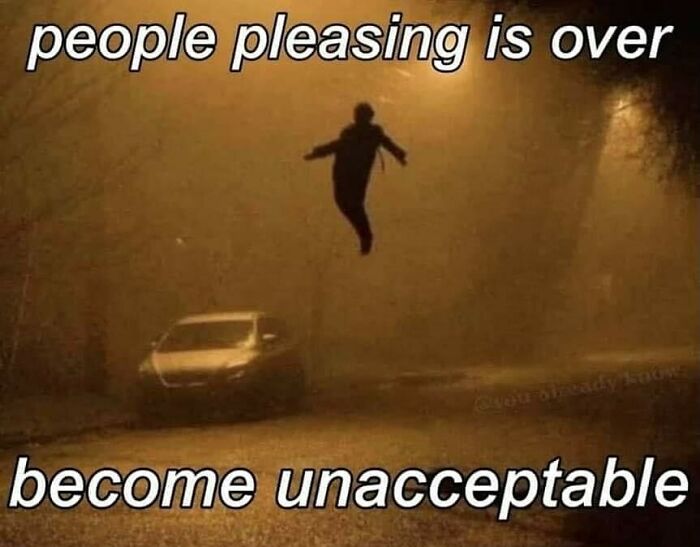 Shadow of a person appears to be floating above a car under dim streetlight in a confusing image where things get weirder.