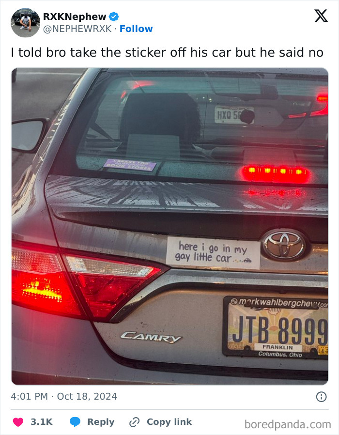 Funny bumper sticker on a Toyota Camry reading here I go in my gay little car, spotted on the road.