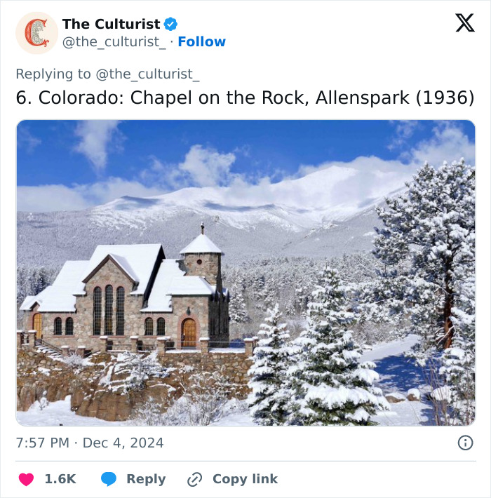 Snow-covered Chapel on the Rock church in Colorado surrounded by trees and mountains, a striking example of beautiful US churches.