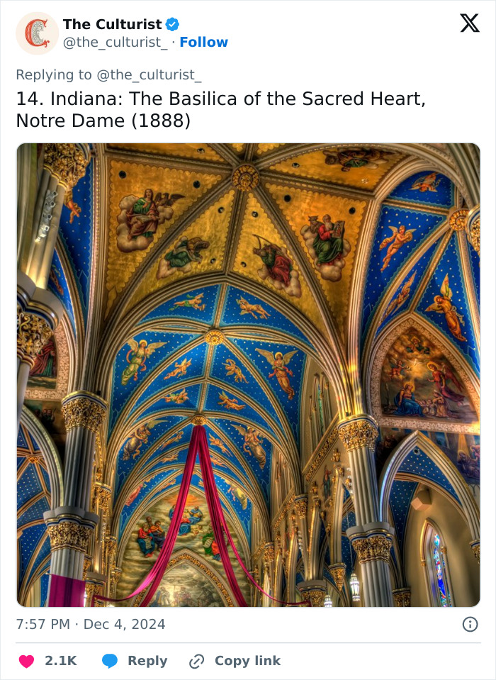 Intricate ceiling artwork and colorful frescoes inside a spectacular church in Indiana, showcasing striking US church architecture.