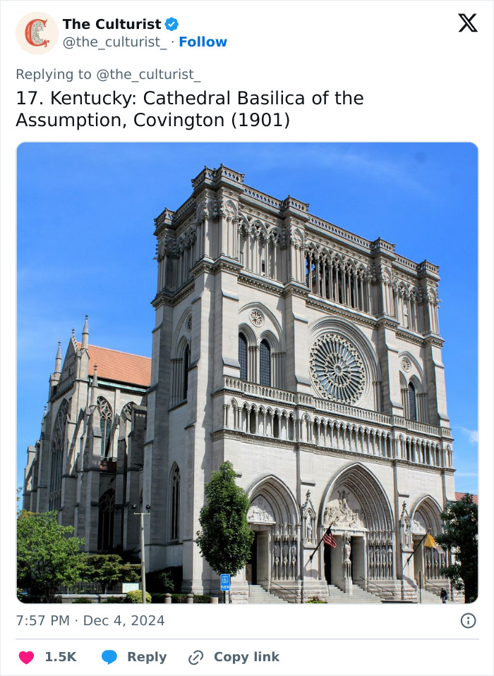 Cathedral Basilica of the Assumption in Kentucky, a beautiful and striking church showcasing intricate architecture under a clear blue sky.