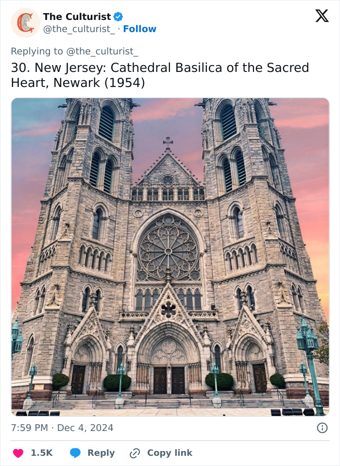 Cathedral Basilica of the Sacred Heart in Newark showcasing beautiful, striking church architecture against a colorful sunset sky.
