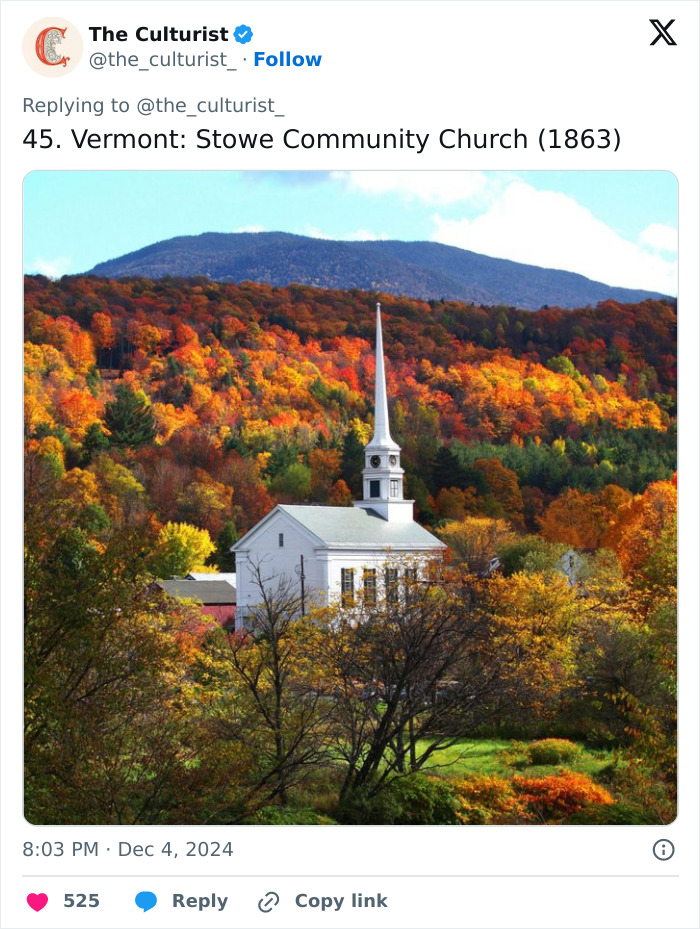 White church with tall steeple surrounded by colorful autumn trees and mountains, a striking church in the US landscape.