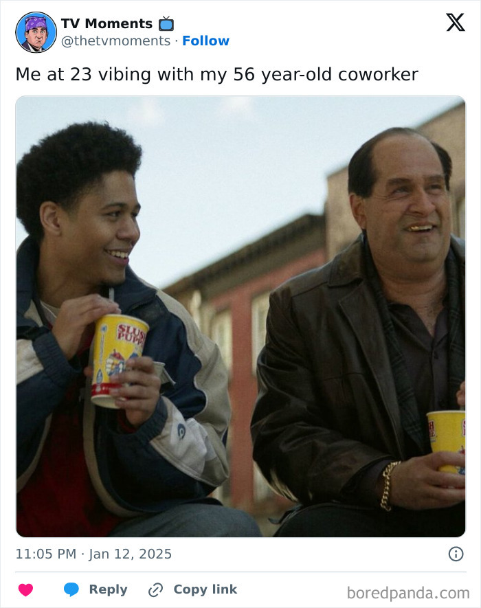 Two men smiling and drinking Slush Puppie beverages, a funny and relatable TV meme moment between coworkers.