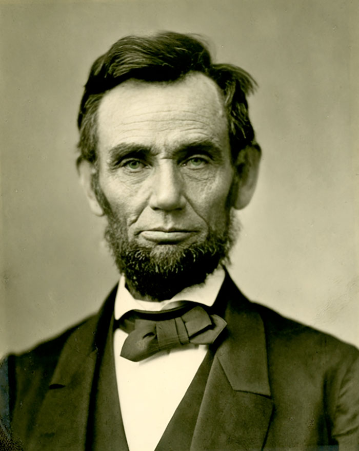 Portrait of Abraham Lincoln in formal 19th-century attire, representing a shocking story from history involving rabbits and Napoleon.