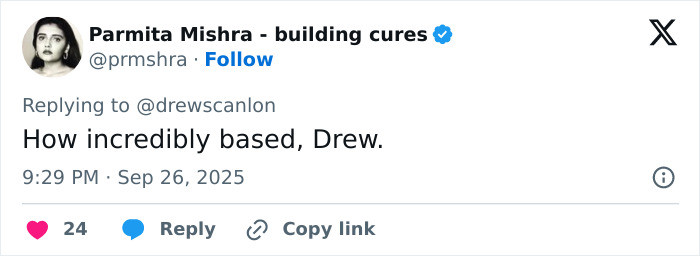 Man behind Blinking Guy GIF smiling in outdoor setting with blurred background, showing changes after 8 years as internet star